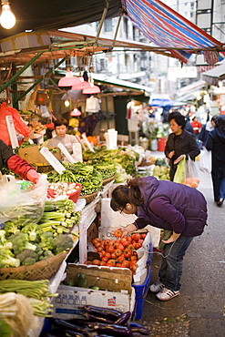 Fruit and vegetables on sale in old Chinese Soho food market in Graham Street, Central Hong Kong, China