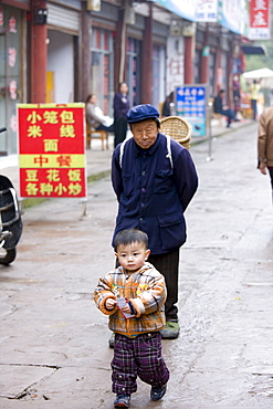 Grandfather with grandson at Baoding, Chongqing. China has one child family planning policy to reduce population.