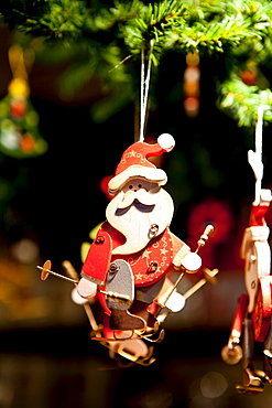 Father Christmas Santa Claus tree ornament at Christmas market, Winter Wonderland, in Hyde Park, London