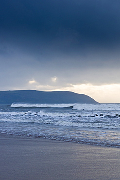 Waves crashing onto the beach at Woolacombe, North Devon, UK