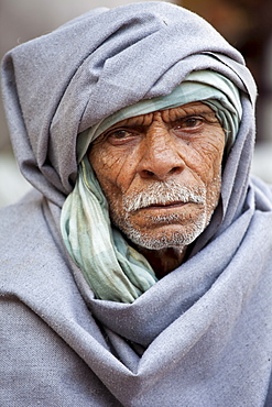 Hindu Indian man in Old Delhi at  Daryagang market, India