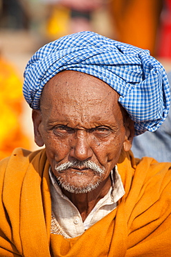 Hindu pilgrim with turban at Dashashwamedh Ghat in holy city of Varanasi, Benares, India