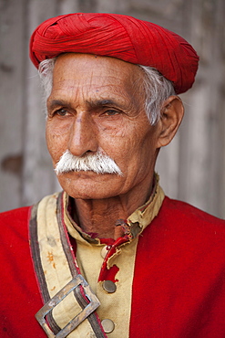 Hindu temple guard in holy city of Varanasi, Benares, India