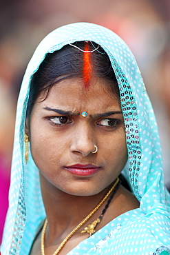 Hindu pilgrim with bindi mark at Vishwanatha Temple (Birla Temple) during Festival of Shivaratri in holy city of Varanasi, India