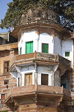 Indian architecture at Ranamahal Ghat by the Ganges River in City of Varanasi, Benares, Northern India