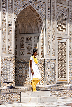 Muslim Punjabi girl at Tomb of Etimad Ud Doulah, 17th Century Mughal tomb built 1628, Agra, India