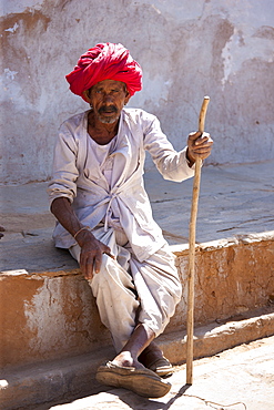 Indian man wearing traditional clothing and Rajasthani turban in village of Nimaj, Rajasthan, Northern India