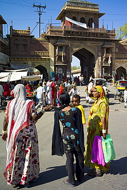 Indian women shopping, street scene at Sardar Market at Girdikot, Jodhpur, Rajasthan, Northern India