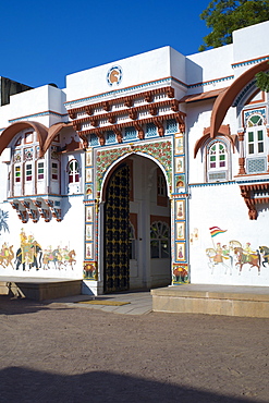 Rohet Garh fortress palace hotel with battlement walls with drawings of aristocratic ancestors Rohet, Rajasthan, Northern India