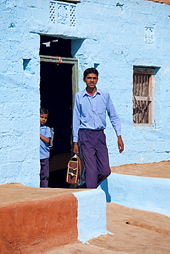 Boys in Hindu Brahman high caste village of Dhudaly heading for school in Rajasthan, Northern India