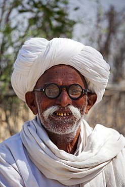 Indian Bishnoi Hindu man at Bishnoi village near Rohet in Rajasthan, Northern India