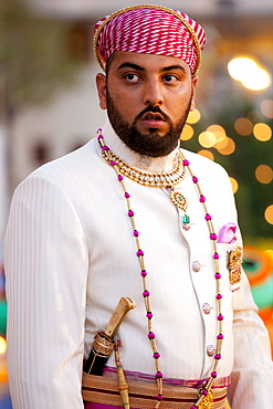 Lakshaya Raj, son and heir of 76th Maharana of Mewar, Shriji Arvind Singh Mewar of Udaipur, at Holi Festival at the City Palace, Rajasthan, India