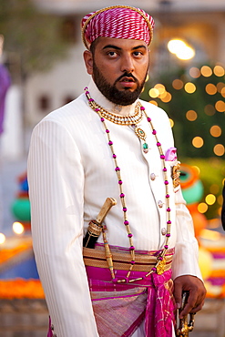 Lakshaya Raj, son and heir of 76th Maharana of Mewar, Shriji Arvind Singh Mewar of Udaipur, at Holi Festival at the City Palace, Rajasthan, India