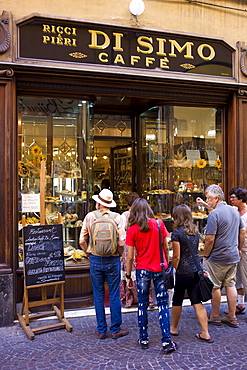 Tourists at Di Simo Caffe in Via Fillungo, Lucca, Italy