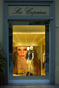 Shop window display of Les Copains fashion clothes shop at Hotel de la Ville in Piazza Degli Antinori, in Florence,Tuscany, Italy