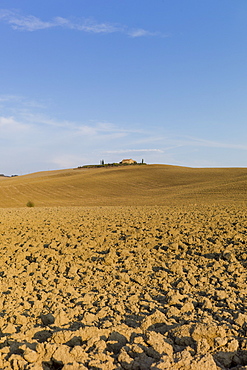 Typical Tuscan parched landscape near Pienza in Val D'Orcia, Tuscany, Italy