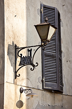 Lamp in Via Ricasoli in old hill town of Montalcino, Val D'Orcia,Tuscany, Italy