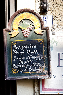 Chalk board restaurant menu of La Bottega di Giovannino with local specialities on offer in Radda-in-Chianti, Tuscany, Italy