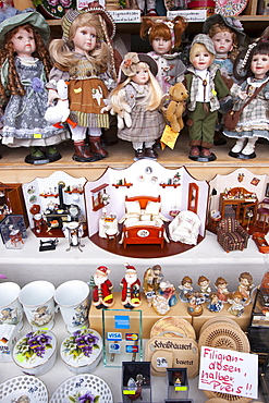 Toy shop window with dolls and traditional goods in Berchtesgaden in Baden-Wurttenberg, Bavaria, Germany