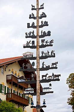 Maypole of rural pastoral and trades scenes at Grassau in Baden-Wurttenberg, Bavaria, Germany