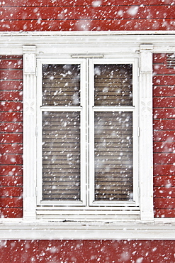 Traditional architecture on snowy day in city of Tromso, in the Arctic Circle in Northern Norway