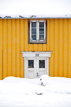 Traditional wooden buildings along Storgata in the quaint area of Tromso, in the Arctic Circle in Northern Norway