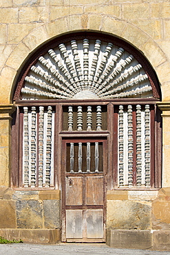 Ornate doorway in Cabezon de Liebana within the Picos de Europa mountains in Cantabria, Northern Spain