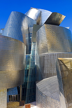 Architect Frank Gehry's Guggenheim Museum futuristic architectural design in titanium and glass at Bilbao, Basque country, Spain