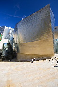 Architect Frank Gehry's Guggenheim Museum futuristic architectural design in titanium and glass at Bilbao, Basque country, Spain