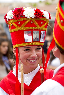 Dancer in procession through the streets during San Fermin Fiesta at Pamplona, Navarre, Northern Spain