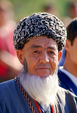 Man in traditional costume and Astrakhan hat  in the City of Mary, Turkmenistan