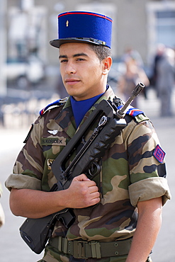 Soldier in the French military attending parade in Pau in the Pyrenees, France