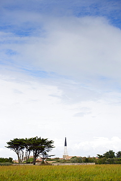 Le Clocher d'Ars church spire in the landscape at Ars en Re on the island of Ile de Re in France