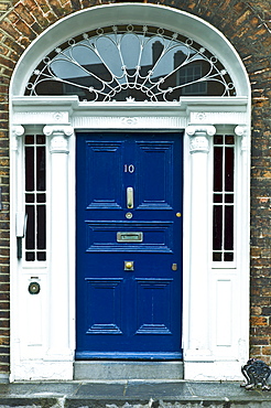 Stylish front door of Georgian townhouse with fanlight window in Limerick City, County Limerick, Ireland