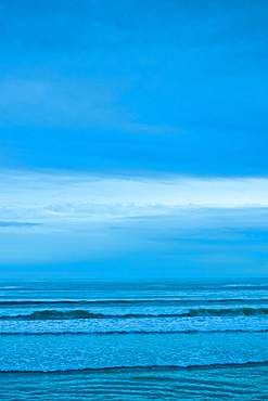 The surf at high tide at the beach resort of Lahinch (Lehinch) at twilight, County Clare, West Coast of Ireland