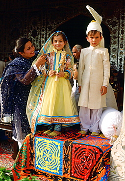 Children dressed as bride and groom in Pakistan