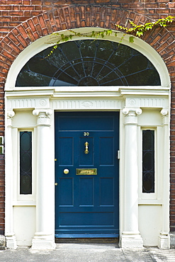 Traditional doorway with fanlight windows in Merrion Square famous for its Georgian architecture, Dublin, Ireland