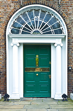 Traditional doorway with fanlight windows in Merrion Square famous for its Georgian architecture, Dublin, Ireland