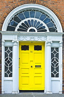 Traditional doorway with fanlight windows in Merrion Square famous for its Georgian architecture, Dublin, Ireland