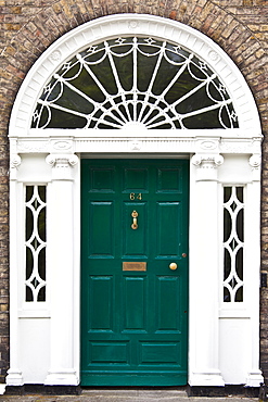 Traditional doorway with fanlight windows in Merrion Square famous for its Georgian architecture, Dublin, Ireland