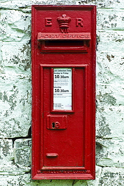 Wall mounted postbox with E R Elizabeth Regina cypher in Anchor, Shropshire, United Kingdom