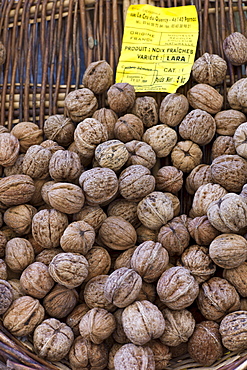 Fresh walnuts on sale at food market at La Reole in Bordeaux region of France