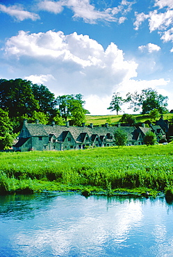 Arlington Row cottages in Bibury in the Cotswolds, Gloucestershire, England