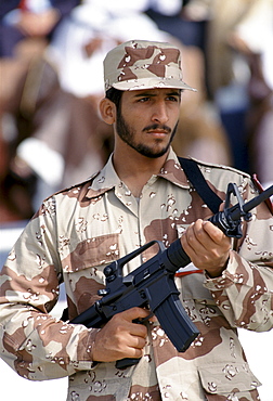 Armed solder in camouflage uniform in Abu Dhabi  for celebration of 20th Anniversary of United Arab Emirates