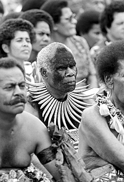 Locals attending traditional native kava ceremony at tribal gathering in Fiji, South Pacific