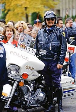 Motorcycle policeman on crowd control in Canada