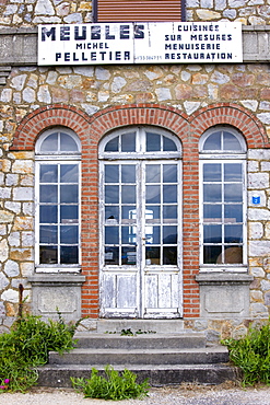 Meubles furniture shop in Domfront medieval town, Normandy, France