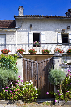 Typically French house in Bourdeilles popular tourist destination near Brantome in Northern Dordogne, France