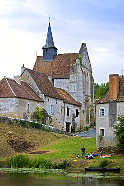 People with kayaks in traditional medieval village of Angles Sur L'Anglin, Vienne, near Poitiers, France