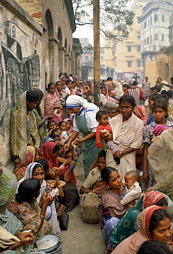 Poor women queuing for food at Mother Teresa's Mission in Calcutta,  India